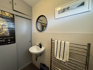 COATS CUPBOARD IN CLOAKROOM- click for photo gallery